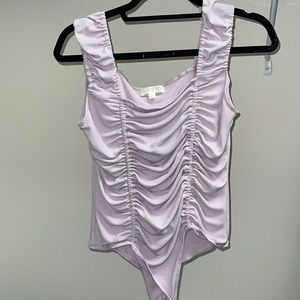 Large lilac bodysuit by Cloud Ten